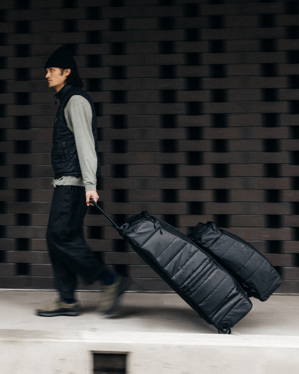 Hugger 1st Generation Roller Bag Check-in 90L Black Out